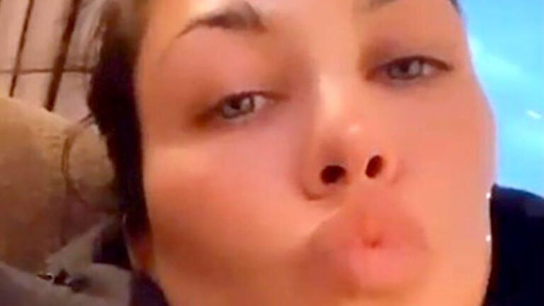 Kourtney Kardashian looks unrecognizable with BLUE eyes in new selfie after she slams plastic surgery rumors