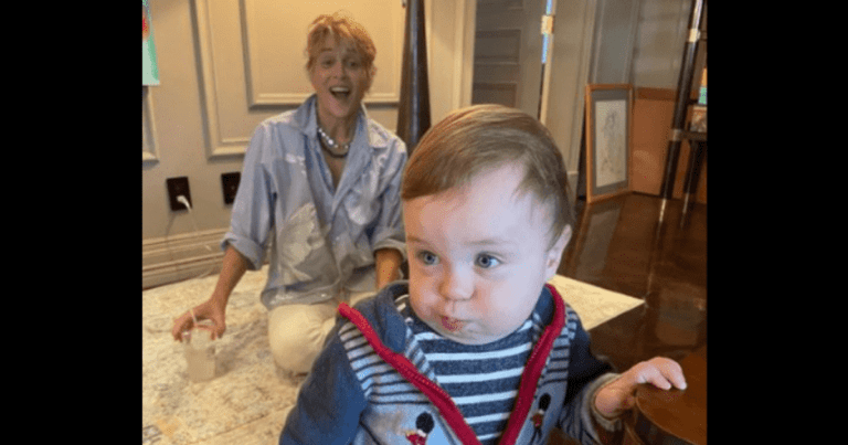 Sharon Stone gushes with pride as baby godson grips table and balances himself without help