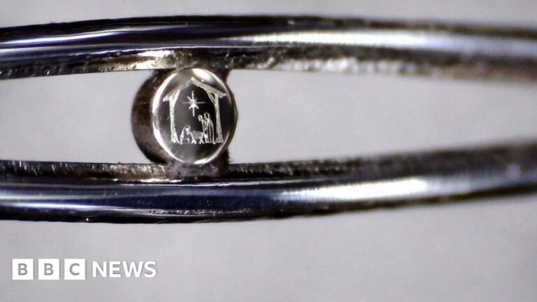 Tiny Nativity scene in the eye of a needle on display in Birmingham – BBC
